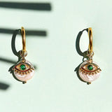 Green Eye Huggie Hoops